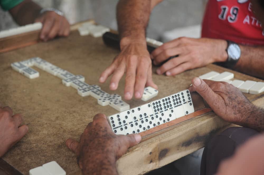 domino traditional game players in cuba