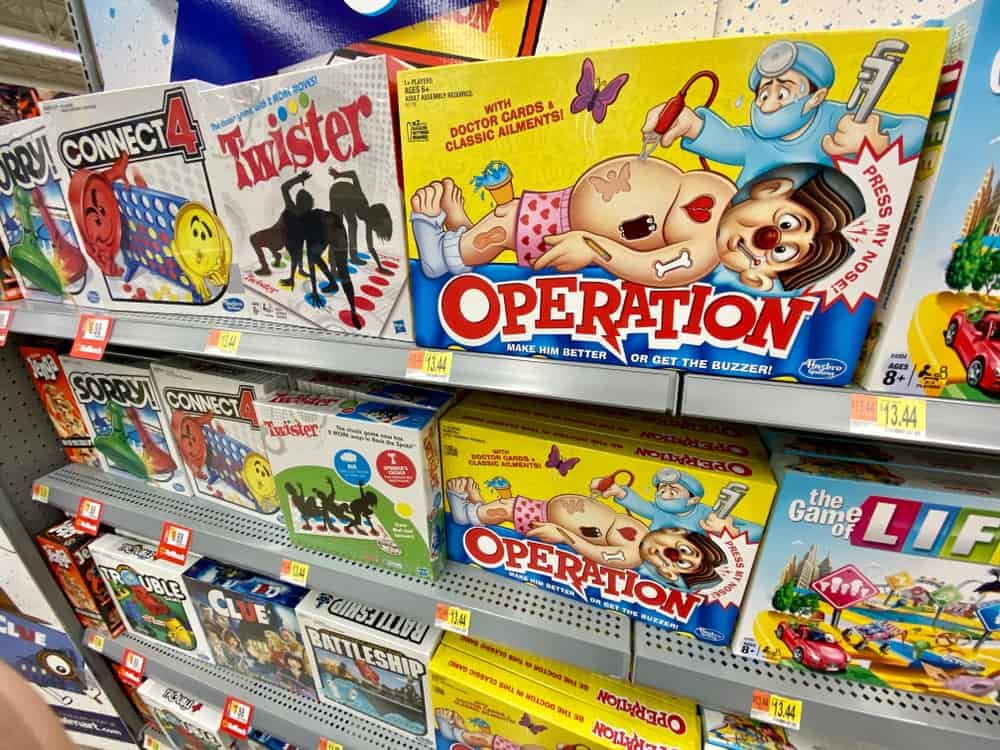 Classic board games on a store shelf, Operation, Twister and connect 4 amongst others