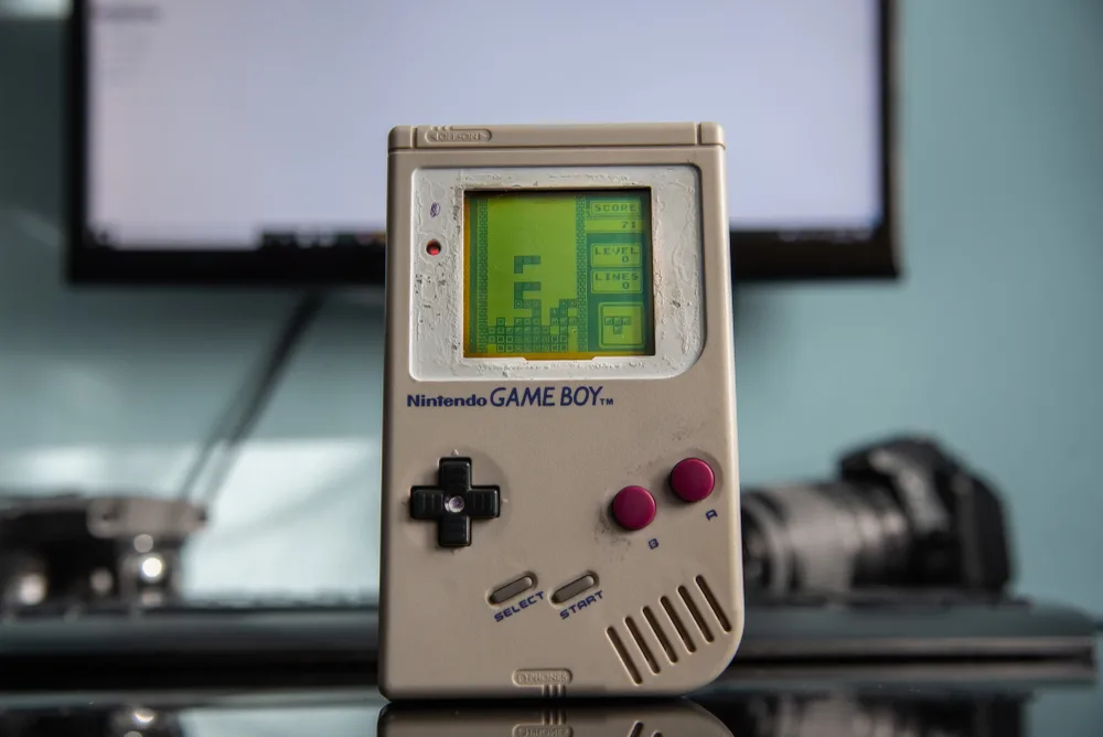 Nintendo Game Boy gaming console with Tetris game on the screen