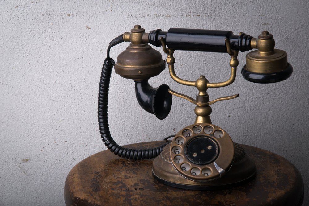 Vintage old telephone with old background