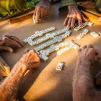 elderly farmers playing dominoes in the country around Vinales, Cuba