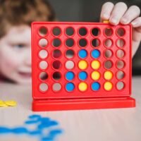 child plays connect 4