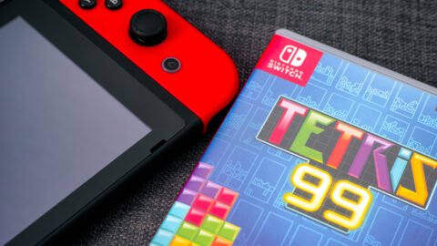 Tetris 99 video game box and Nintendo Switch