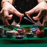 shuffles poker cards in a casino