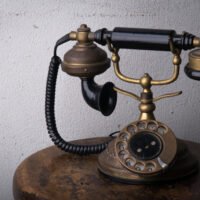 Vintage old telephone with old background